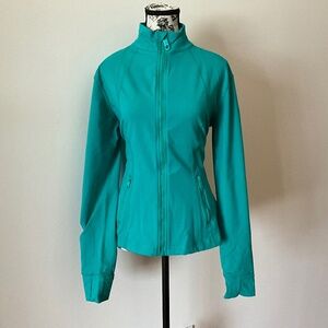 Kirkland Signature Women’s athletic jacket. Teal/Turquoise Color Size XL